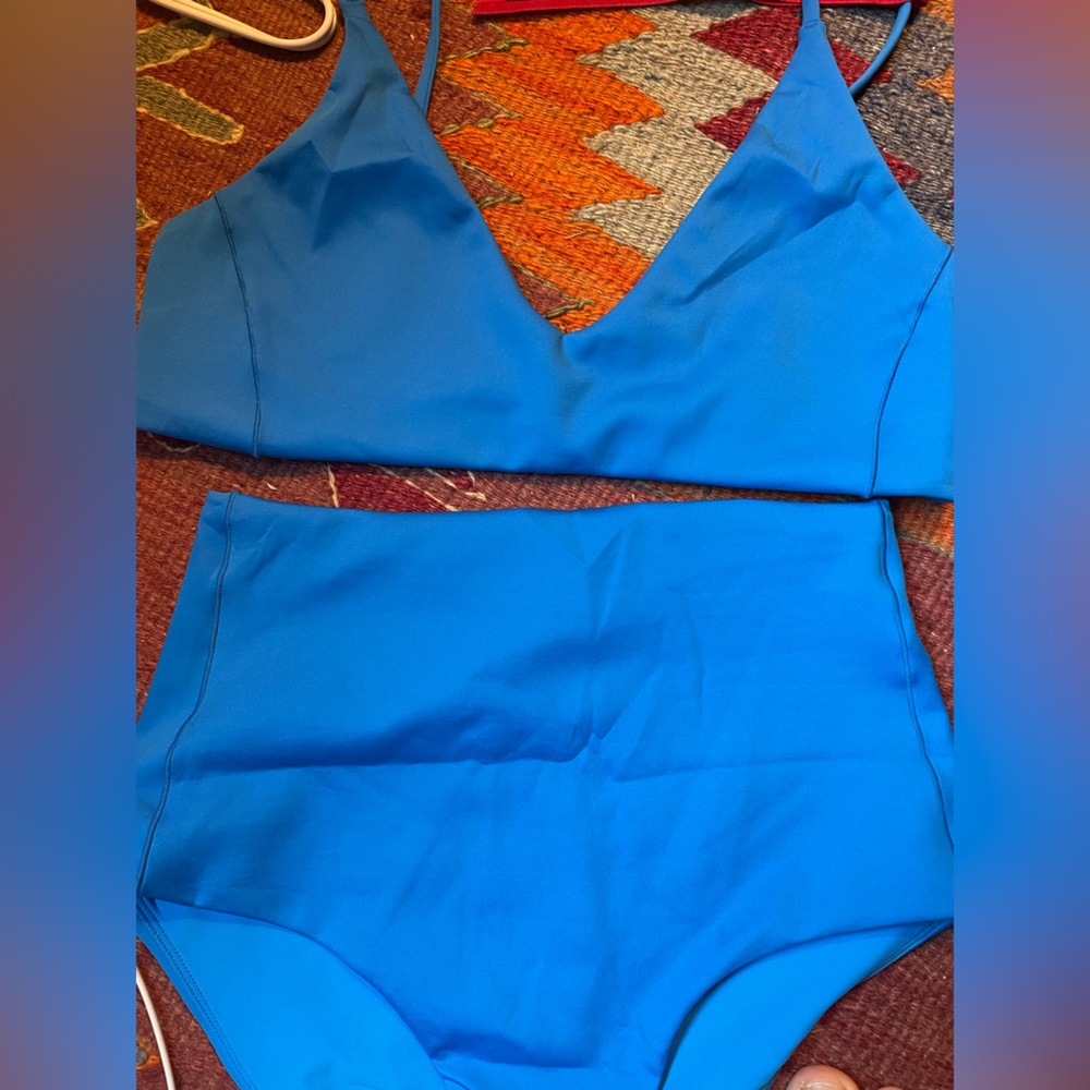 Left on Friday NWT Sunday top and Hi Tide bottoms in Wipeout